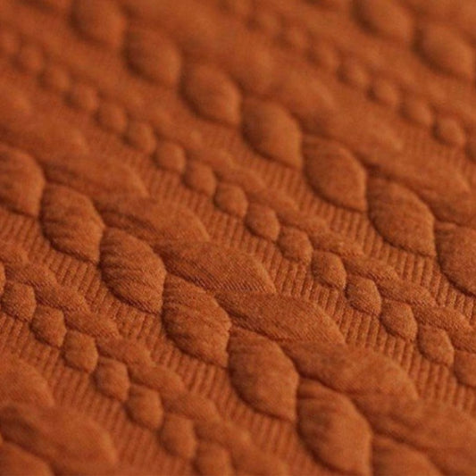 Jacquard Strickstoff Zopfmuster Cognac